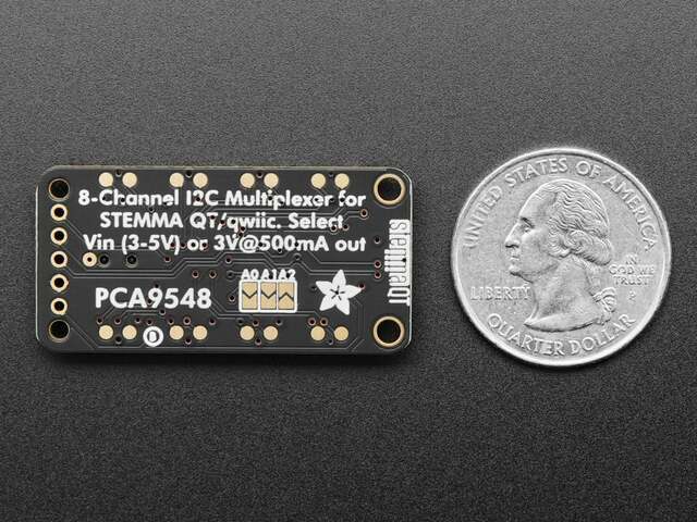 The back of the PCA9548 multiplexer board beside a US quarter, labelled "8-Channel I2C Multiplexer for STEMMA QT/qwiic", with its A0, A1 and A2 address jumpers.